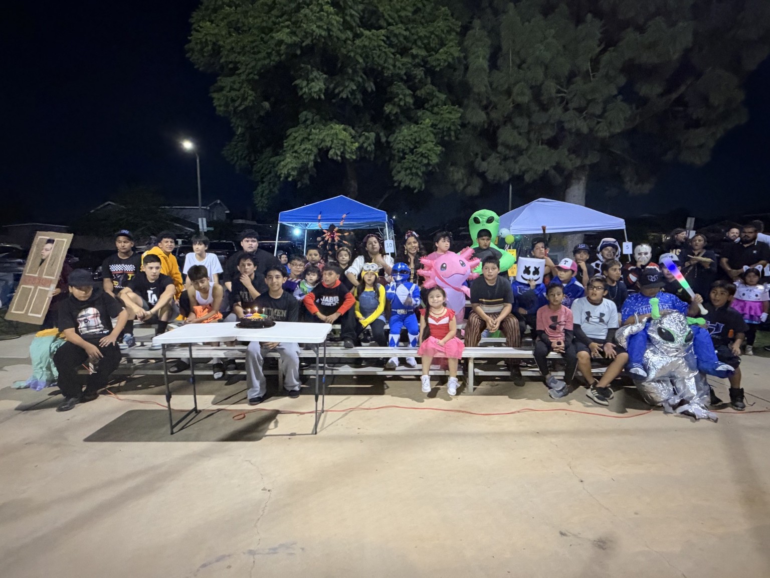 Large community group photo at Hitmen Trunk or Treat