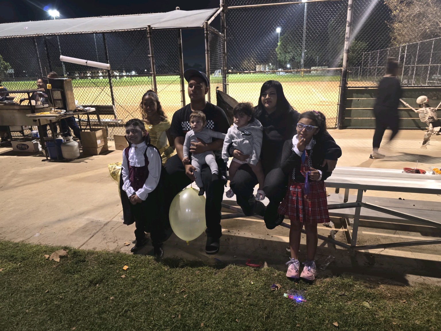 Family photo during the Hitmen Trunk or Treat event